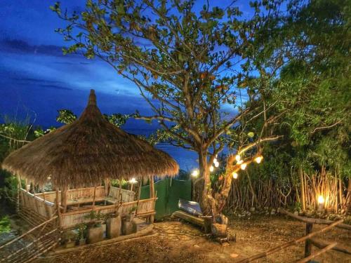 Zahrada ubytování Capiz Beach Villa w/ pool (entire cottage for 12)