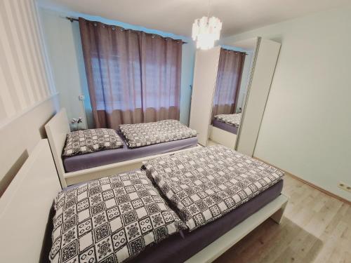 Voodi või voodid majutusasutuse Apartment Nordtraum toas