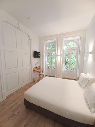 Letto o letti in una camera di LAA Studios