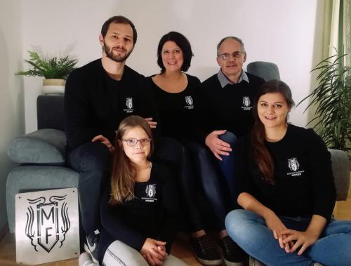 a group of people sitting on a couch at Gasthof Moser in Fohnsdorf