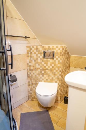 Koupelna v ubytování Apartamenty Aleksandra