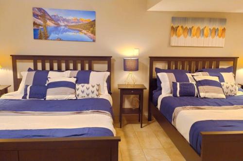Кровать или кровати в номере *Luxury 1 BR Suite - Own Access*