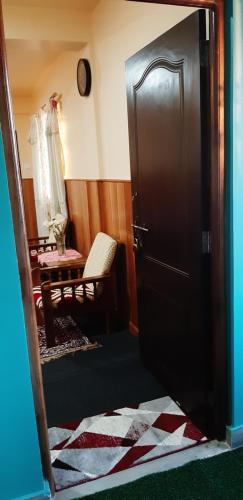 Ένα ή περισσότερα κρεβάτια σε δωμάτιο στο WARUHANG HOMESTAY