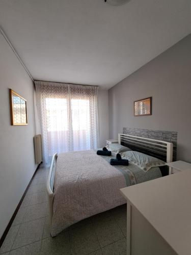 A bed or beds in a room at Casa Meri