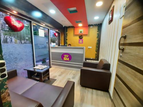 Posezení v ubytování SM Rooms HSR Layout Bengaluru