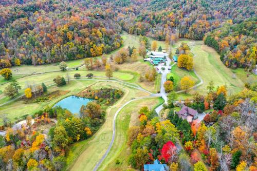 an aerial view of a golf course with autumn foliage at Laurel Lodge At Last in Townsend