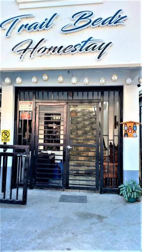 a store front of a store with the doors open at Trail Bedz Homestay in Baguio