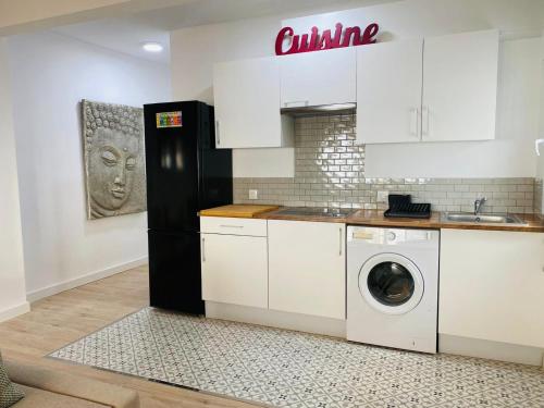 Η κουζίνα ή μικρή κουζίνα στο Apartamentos Carr