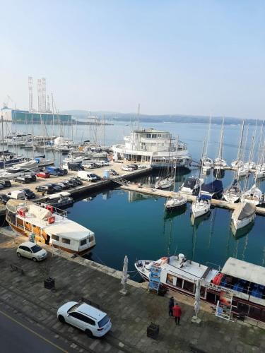 a group of boats docked in a marina at Apartment Marina with sea view in Pula