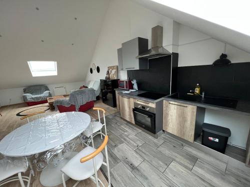 Dapur atau dapur kecil di La Fensch Wifi Un-Sejour-à-Part