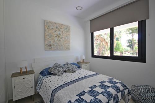 Posteľ alebo postele v izbe v ubytovaní Sun&Beach Carihuela