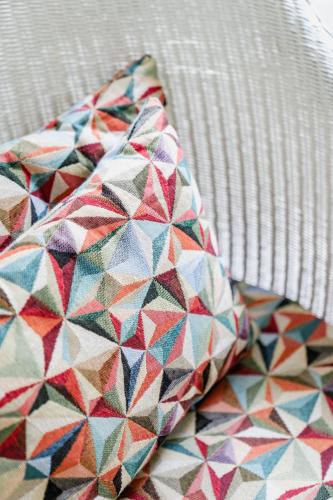 a pillow sitting on top of a bed at Lee House in Lynton