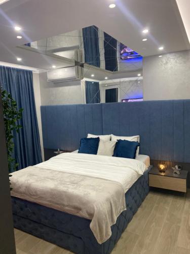 Postel nebo postele na pokoji v ubytování SpaNish apartman