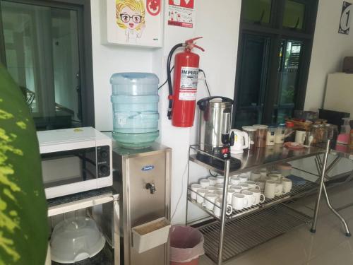 Una cocina o zona de cocina en DD Residence Sai5 Salaya ห้องพัก ดีดี สาย5 ศาลายา