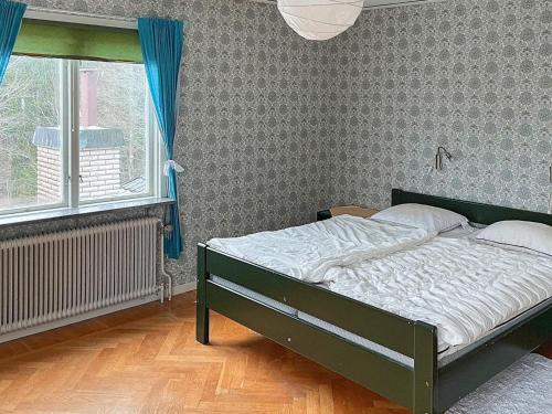 Säng eller sängar i ett rum på Holiday home ÖSTRA ÄNTERVIK II