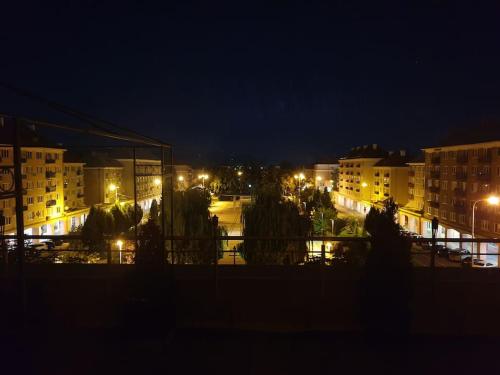 a view of a city at night with buildings at Mezonetovy Apartmán v centre Novej Dubnice in Ilava