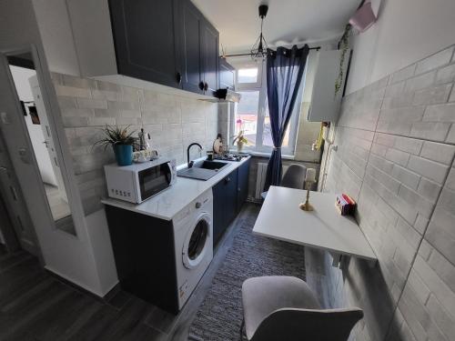 Una cocina o kitchenette en Nico