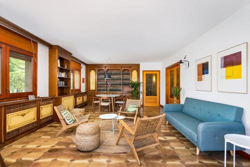 Χώρος καθιστικού στο Lodging Apartments Villa el Raco