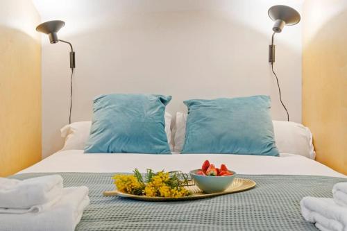 Ένα ή περισσότερα κρεβάτια σε δωμάτιο στο Lodging Apartments Villa el Raco