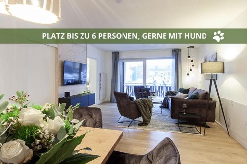 a living room with a couch and chairs and a table at Die Fichtelsuite 1-6 Pers Ferienwohnung nahe Ochsenkopf Süd 800m in Fleckl in Warmensteinach