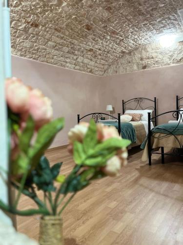 Postel nebo postele na pokoji v ubytování Gasparro House