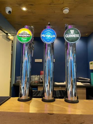 a row of awards on top of a table at ibis budget Belfast City Centre in Belfast