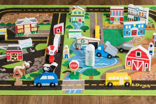 a toy city with cars and a stop sign at Meliá Phuket Mai Khao in Mai Khao Beach