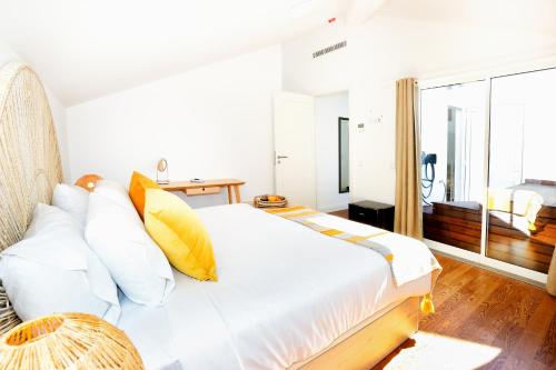 Postel nebo postele na pokoji v ubytování Tropical Flavour Apartment