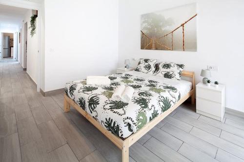 A bed or beds in a room at Gran piso en el centro histórico