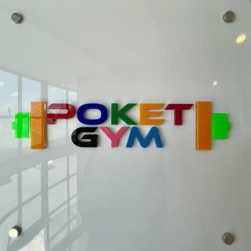 a sign that says pixett gym on a wall at A Scenic Escape within Nairobi in Nairobi