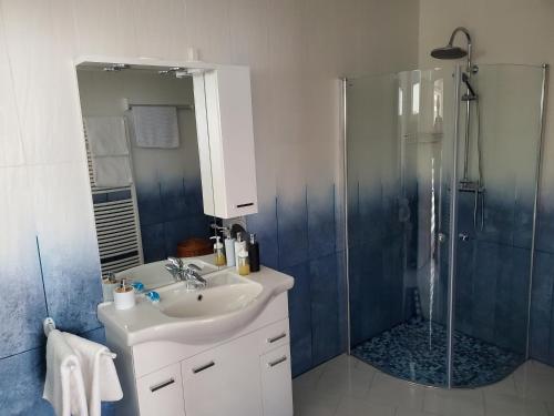 a bathroom with a sink and a shower at Andrea in Mürzzuschlag