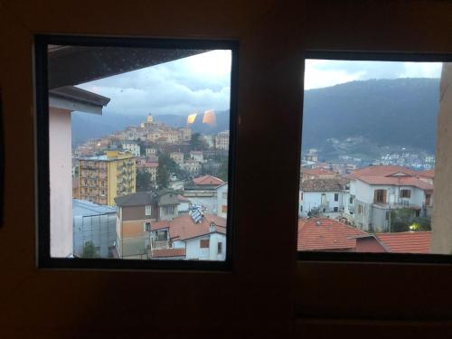 a view of a city from a window at La Casa nella Pineta in Fiuggi