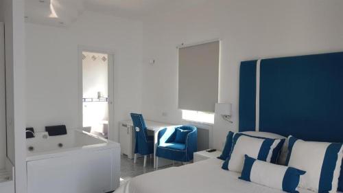Postel nebo postele na pokoji v ubytování Hotel Bristol