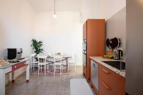 Kuchyň nebo kuchyňský kout v ubytování Al Dio Bes