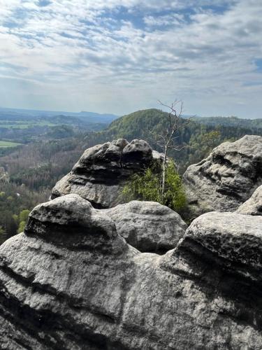 a view from the top of a mountain with rocks at U Vaclava in Hřensko