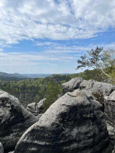 a group of rocks on top of a mountain at U Vaclava in Hřensko