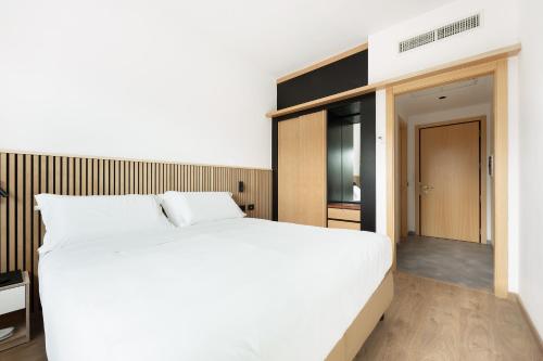 Postel nebo postele na pokoji v ubytování Moon Palace Hotel