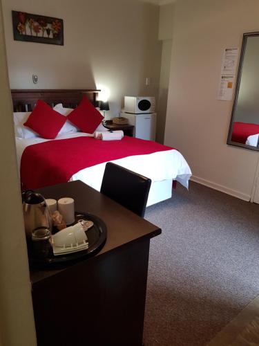 Ένα ή περισσότερα κρεβάτια σε δωμάτιο στο Sekelbos Guesthouse