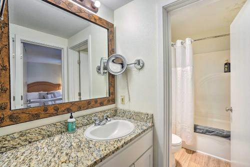a bathroom with a sink and a mirror at Seventh Mountain Condo with Resort Amenities! in Bend