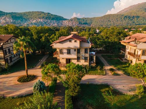 an aerial view of a house in a village at Enso Inn in Fethiye