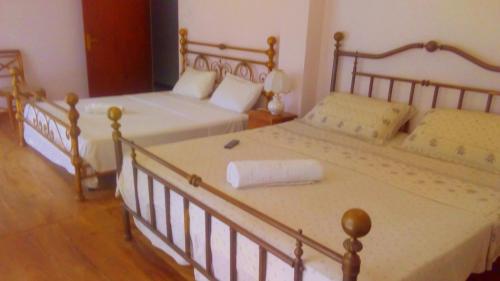 Cama o camas de una habitación en Himagira Hotel