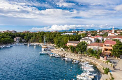 an aerial view of a marina with boats in the water at Apartments Olive i Lavender in Mandre