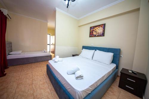 Postel nebo postele na pokoji v ubytování Hotel Primavera