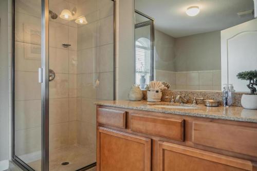 a bathroom with a shower and a sink at MVC - Unit 3707 - Sweet Wilderness in Pigeon Forge