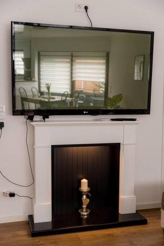 Televisyen dan/atau pusat hiburan di Wohnung Hirschhöhe im Taunus