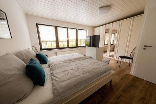 Postel nebo postele na pokoji v ubytování Wohnung Hirschhöhe im Taunus