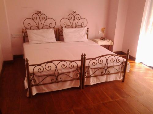 Cama o camas de una habitación en Himagira Hotel