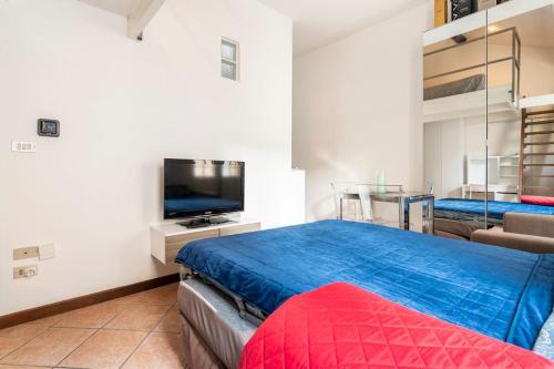 A bed or beds in a room at Grazioso