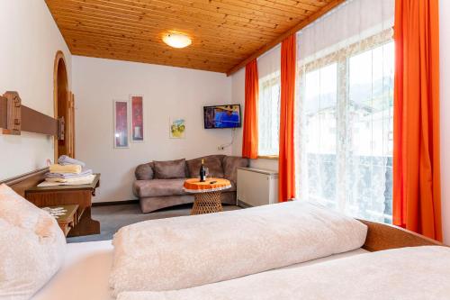 Postel nebo postele na pokoji v ubytování Appartements Dreimäderlhaus