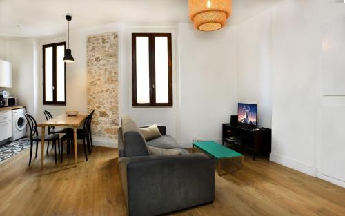 Χώρος καθιστικού στο Appartement élégant et lumineux pour 4 personnes à Antibes by Weekome